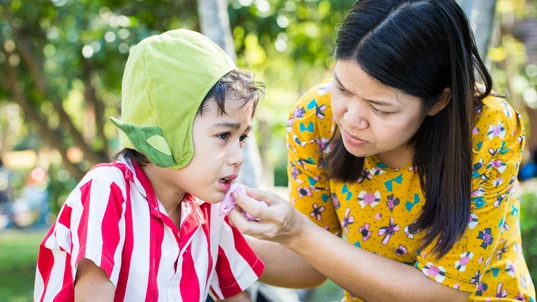 Child with mouth injury